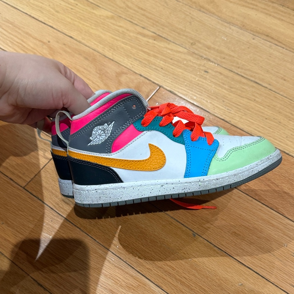 Nike Kids Sneakers with Orange and Blue Accents